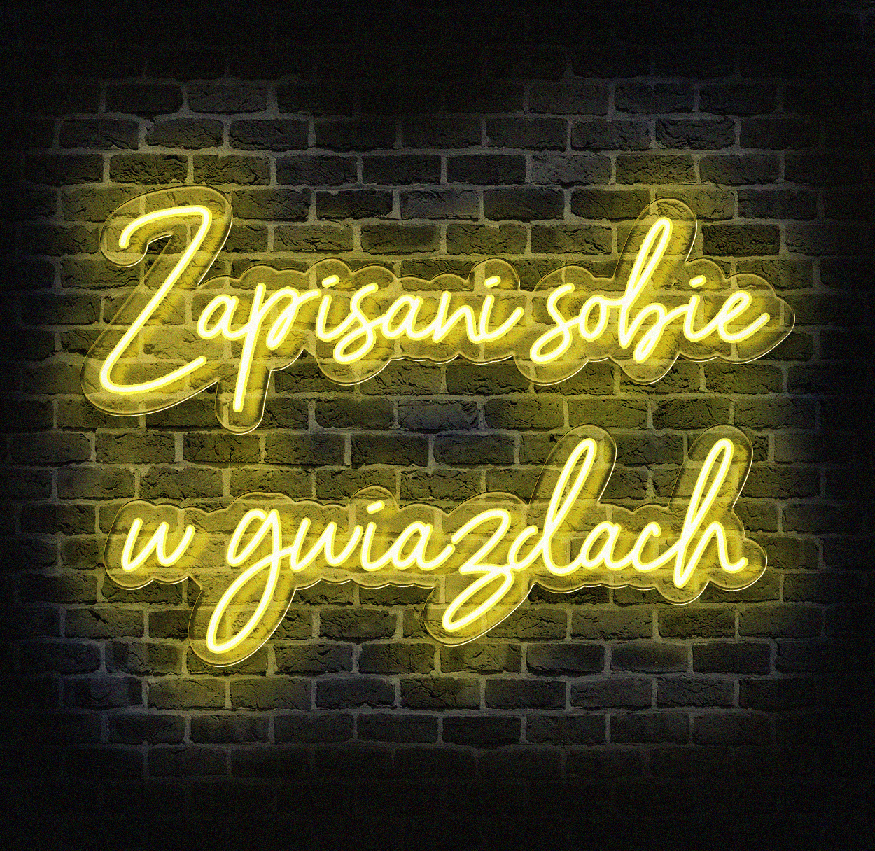 Neon Zapisani sobie w gwiazdach świecący na tle ciemnej ściany