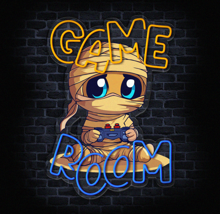 Neon LED „Game Room” z mumią gracza trzymającą joystick na tle ceglanej ściany.