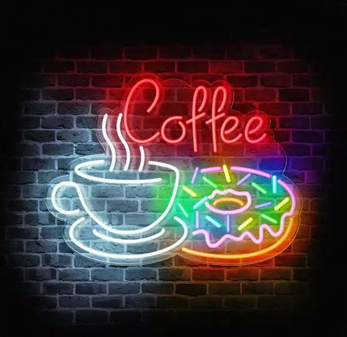 Neon LED kawa i donut na ceglanej ścianie.