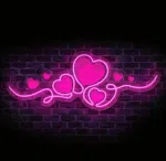 Neon LED z sercami w kolorze różowym na tle ceglanej ściany