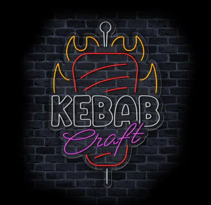 neon reklamowy kebab w witrynie food trucka